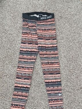 Women's Nike Cantelope Orange and Black Patterned Leggings Size Small